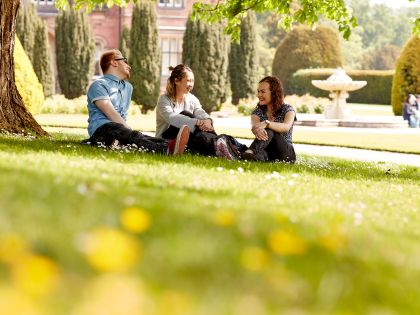 Students sitting on the grass