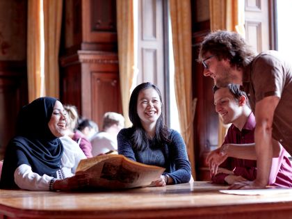 Group of students chatting and laughing