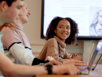 Student smiling during class