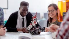 Two students working on an engineering project