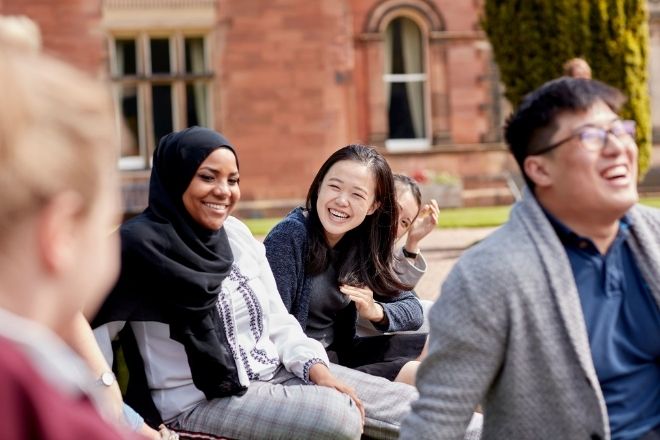 Students sitting together and laughing