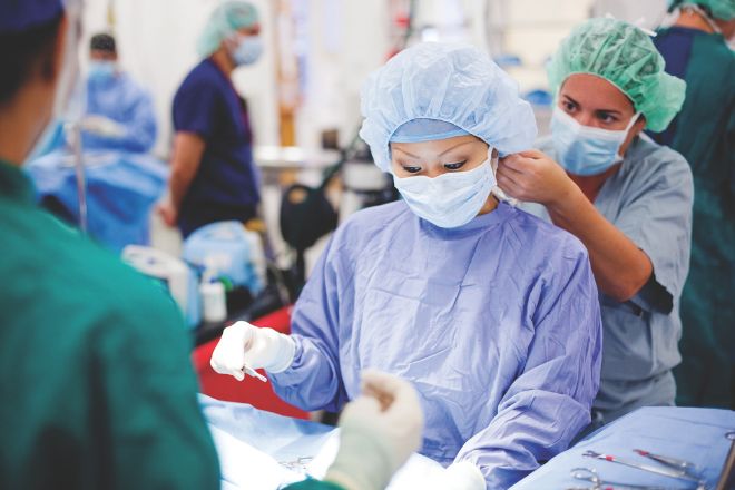 Medical student prepping for surgery